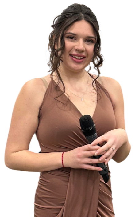 Image of Heather Rae holding a microphone